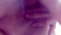 Amateurs bathing in shower bent over.