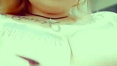 Curvy Tattooed Redhead Plays With Her Big Boobs