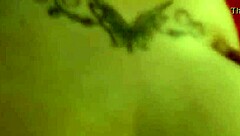 In the dimly lit room, a thick white ass bends over for intense anal fucking in doggystyle position