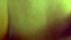 In the dimly lit room, a thick white ass bends over for intense anal fucking in doggystyle position