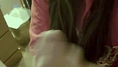 Asian babe gives handjob leading to cum facial