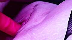 Intensely fucking my pink dildo while wearing heels and stockings.