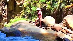 i'm lilyan, masturbatin' by the river with my dildo