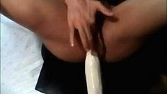 She rides a huge dildo in solo play