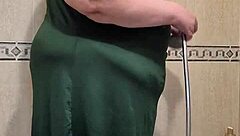 Intriguing mature woman pees and gets fucked by her dildo