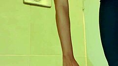 with my hard cock, i masturbate in the crowded gym bathroom.