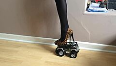 toy car gets crushed under high heels
