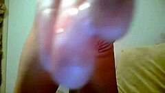 Cam girl plays with her tight pussy using a big dildo. Blonde amateur shows off naked.