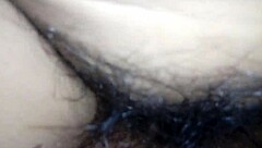 my wife lay there with her legs spread wide, showing off her hairy vagina to everyone watching.