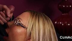 Watch this feisty looker get a sperm load on her face while sucking all the jizm