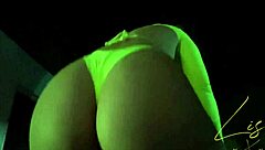 latina babe dances in panties, showing off her natural tits on webcam.