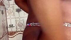 watch this ebony babe fucking herself in the bathroom