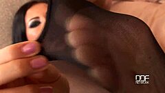 Why Are Lora's Black Stocking Legs So Tempting?