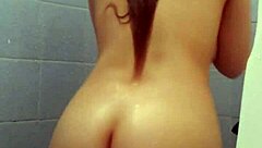 Latina Amateur Strips Naked in Steamy Shower