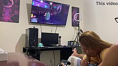 brunette sucking while he plays game