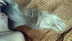She teases with long blonde hair, fingering and kissing before cum on face