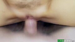 naughty brunette locks eyes with you as she sucks that big cock deep.