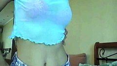 Naughty Ines shows off her natural tits in an amateur close-up