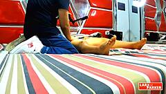 Perla Rica undergoes a full-body massage in the casting room.