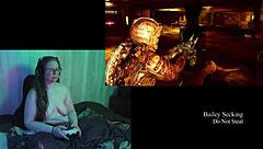 Naked brunette plays Deadspace with big natural tits