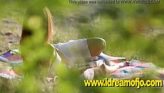 Jo explores her blonde features while fingering in the wilderness.