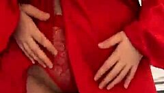 Watch this brunette tease in red lingerie?