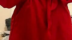 Watch this brunette tease in red lingerie?