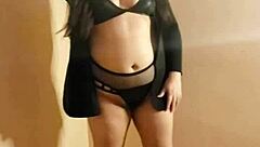 gostosa performs teasing striptease ripping clothes to show small tits