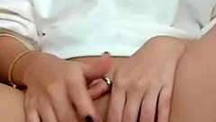 The hot brunette feels excited showing her wet pussy on webcam during masturbation.