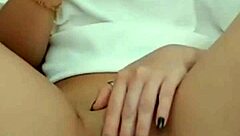 The hot brunette feels excited showing her wet pussy on webcam during masturbation.