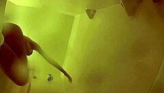 brett rossi lathers up her curvy blonde body in a steamy shower scene