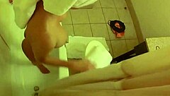 brett rossi lathers up her curvy blonde body in a steamy shower scene