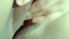 Fingering my wet pussy in bed