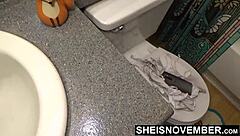 Can you handle this ebony babe undressing in the bathroom after a swim, revealing her petite 18+ curves?