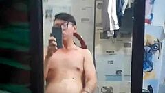 Vietnamese gay top with tattoos chats casually