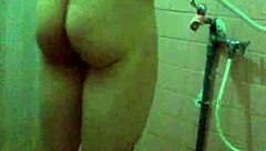 Guy shows off in the bathroom