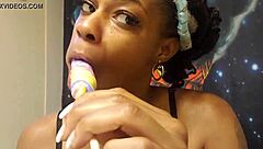 ebony babe black fetish sucking unicorn lollipop