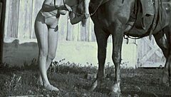 Exploring vintage taboo scenes with unique style.