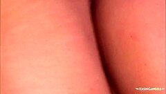 while licking her feet seductively, the brunette wants a foot cumshot