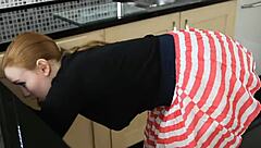 Redhead with saggy boobs caught on voyeur cam searching for keys in kitchen! 😍