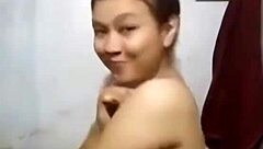 Khmer girl in shower, what’s hiding under that steam?