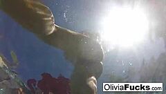 Olivia dominates summer fun with big tits in the pool for wild action!