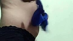 Gay guy tries on his underwear in a casual setting