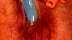 She rubs her hairy pussy again, building to cum.