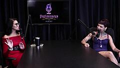 Annie Clementine records a group event with family support in sheer red.