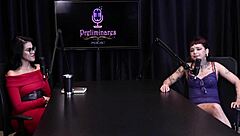 Annie Clementine records a group event with family support in sheer red.