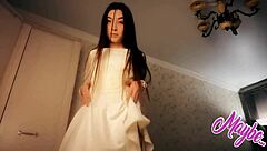 Sweet brunette babe in white dress fingers herself hard.