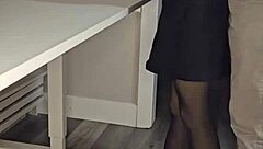 A young poetess reads her poetry with deep emotion in a stunning dress