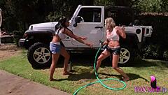 Shy Love and Jenna Foxx lick wet pussy on truck bed.