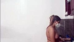 Cute and sexy Latina woman cooks naked showing off her big tall submissive body